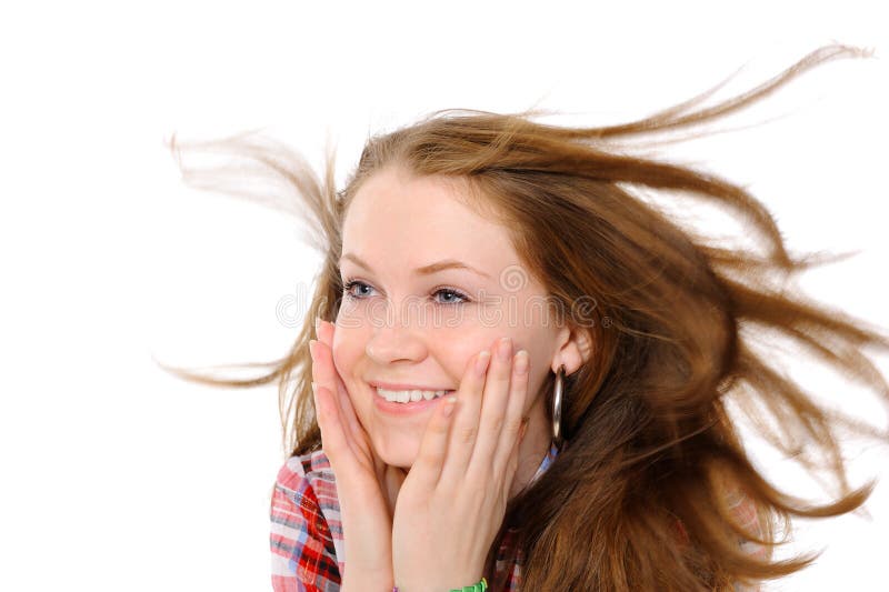 Girl with hair fluttering in the wind