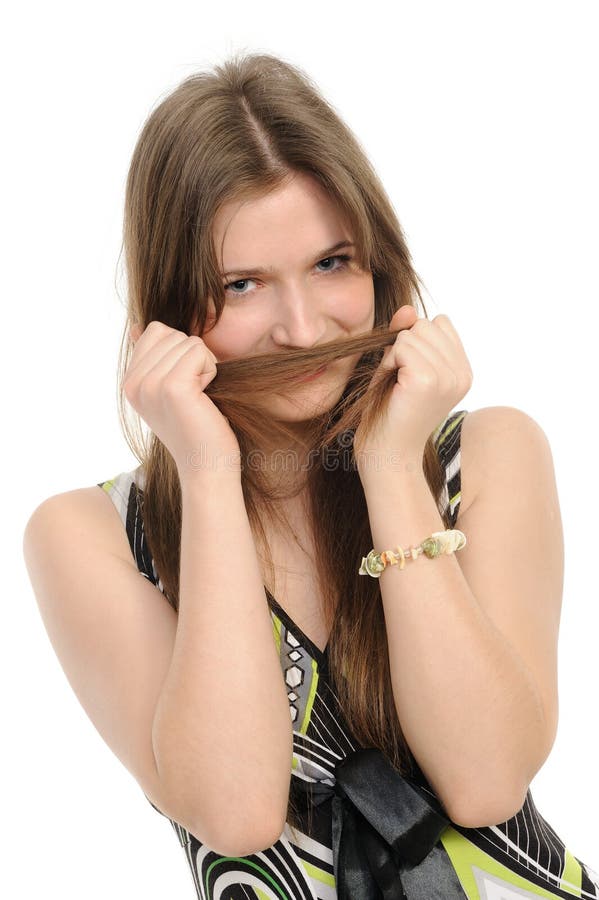 Girl with hairdo putting braid s tail