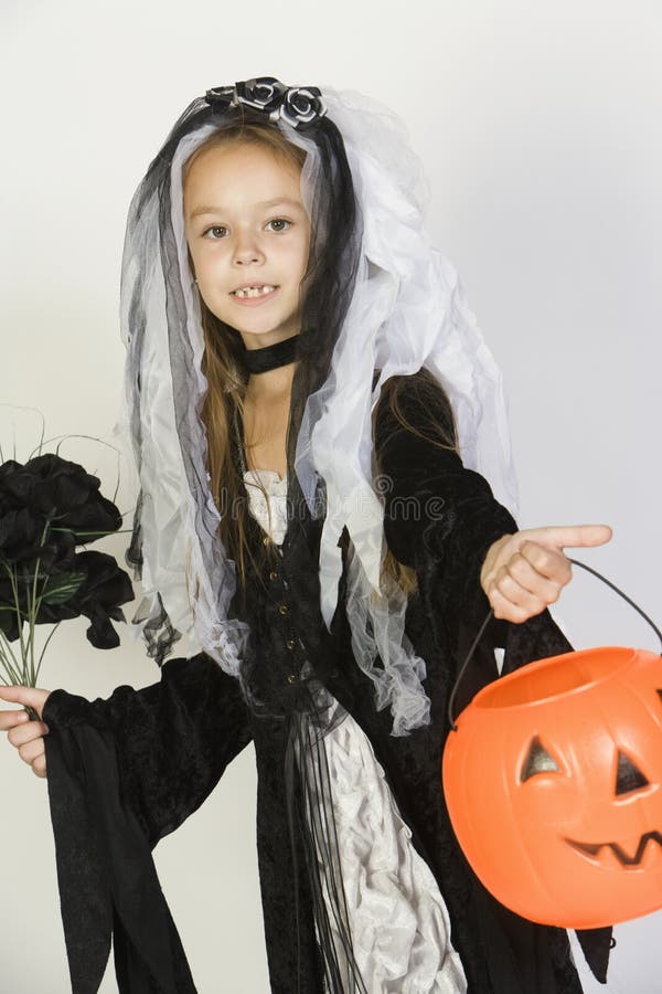 Girl in Halloween Outfit Holding Pumpkin Lantern Stock Image - Image of ...