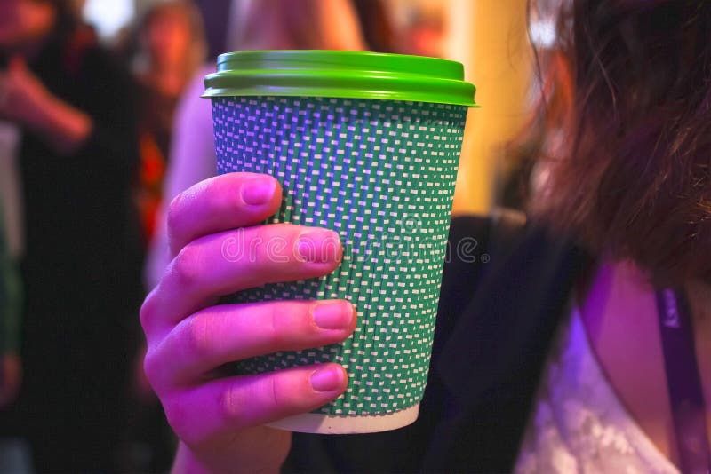 girl hands holding plastic cup of coffee and drinking stock image girl hands holding plastic cup of coffee and drinking stock image