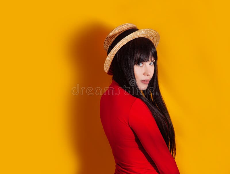 Girl hat sun light shadow tropical yellow orange young woman background red dress tropic royalty free stock photos Girl hat sun light shadow tropical yellow orange young woman background red dress tropic royalty free stock photos