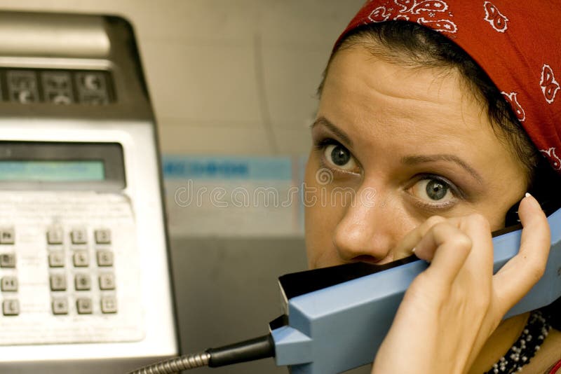 Girl having a call on a telephone