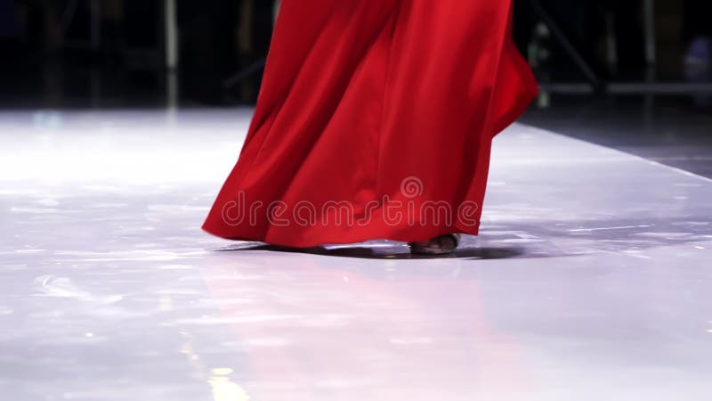 Girl heels red dress sexy step foot close up defile catwalk woman slow motion 4K