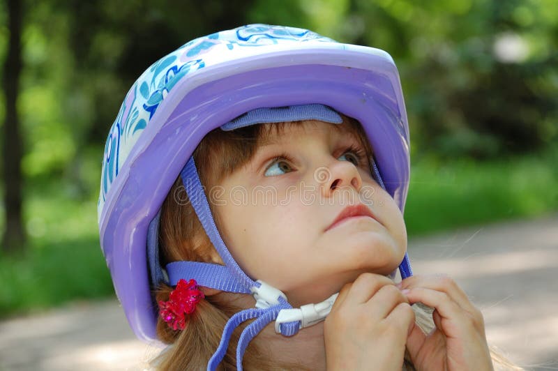 Girl with a helmet stock image. Image of head, unclasping 9539099