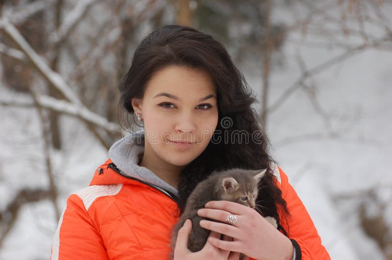 Girl with her cat stock image. Image of cold, look, animal 28320621