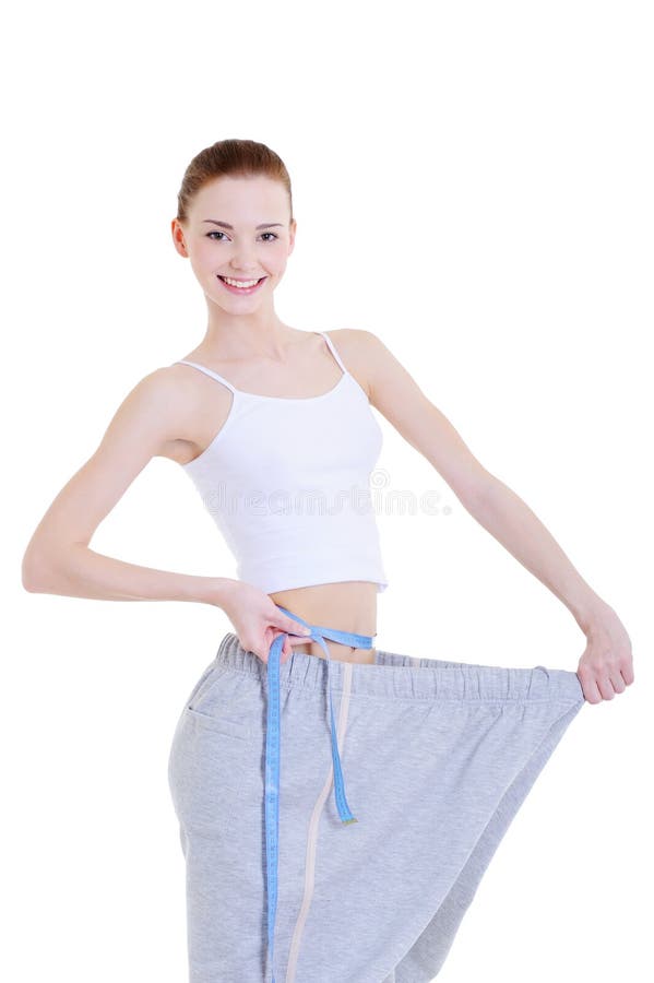 Girl her measuring thin waist στοκ εικόνες με δικαίωμα ελεύθερης χρήσης