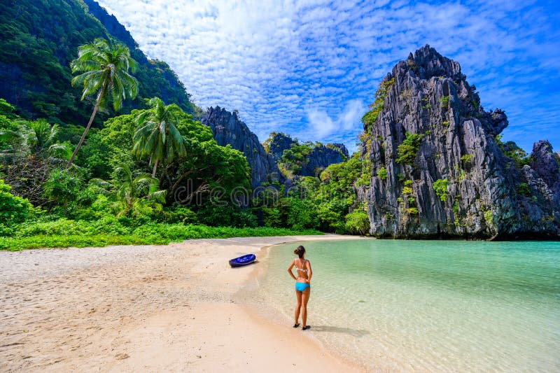 Girl At Hidden Beach In Matinloc Island El Nido Palawan Philippines Paradise Lagoon And