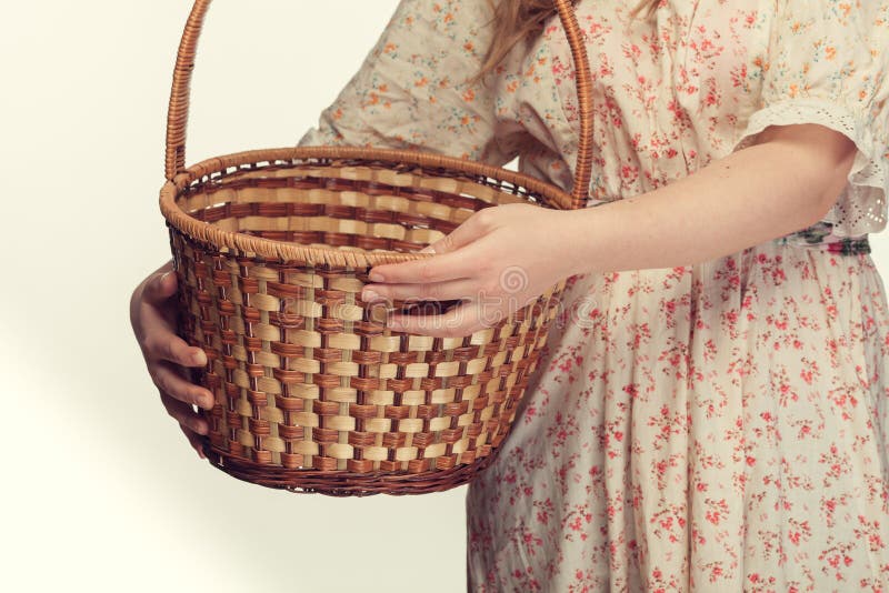 Girl holding a basket stock image. Image of copyspace 48873663