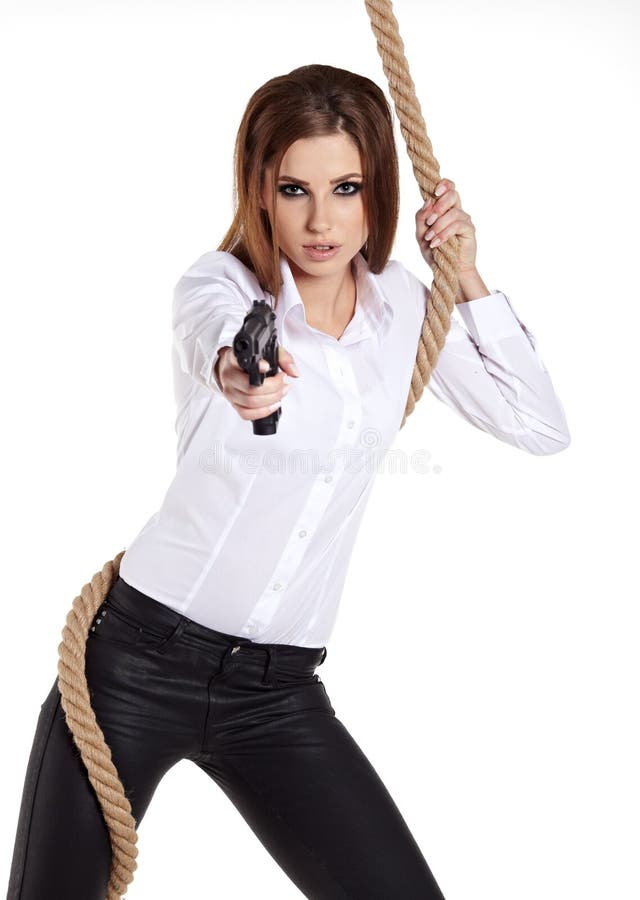 girl holding a black gun. girl holding a black gun