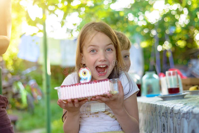 Girl Holding a Cake at 9 Years Old Stock Photo Image of celebration, cheerful 243293510