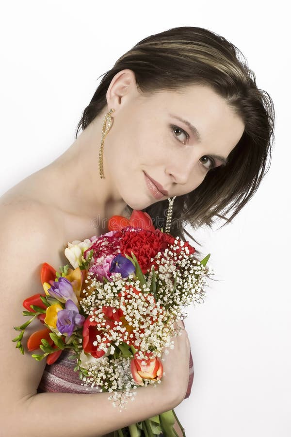 Girl holding colorful flowers