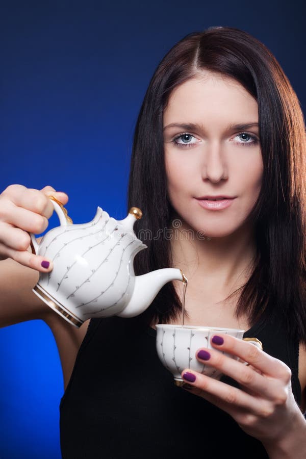 Girl holding cup of tea stock photo. Image of happy, attractive 18581614