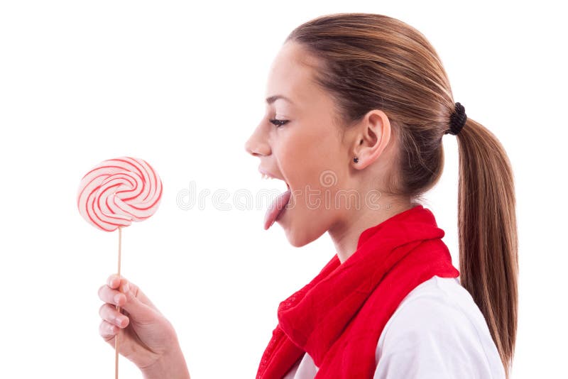 Girl Holding and Licks a Lollipop Stock Im picture