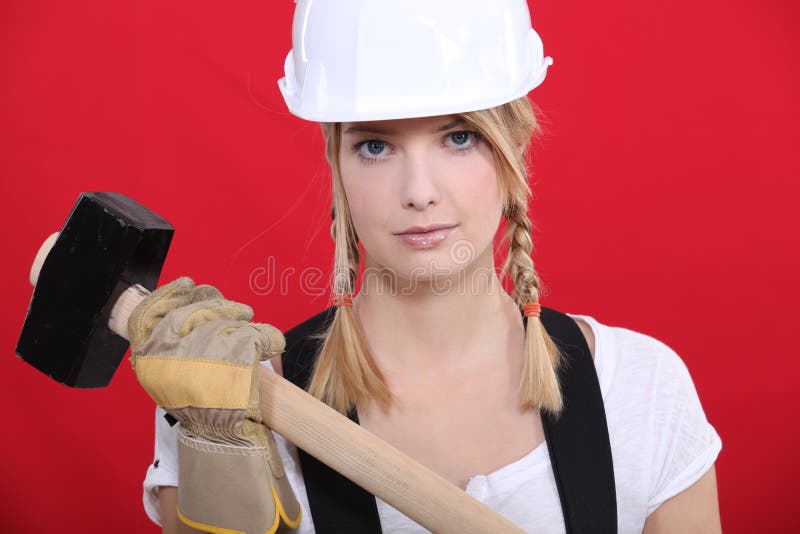 Girl holding mallet royalty free stock photo
