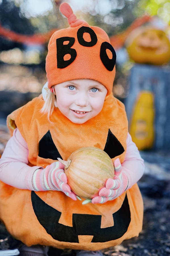 Girl Holding Pumpkin. Halloween Concept Stock Image - Image of holiday ...