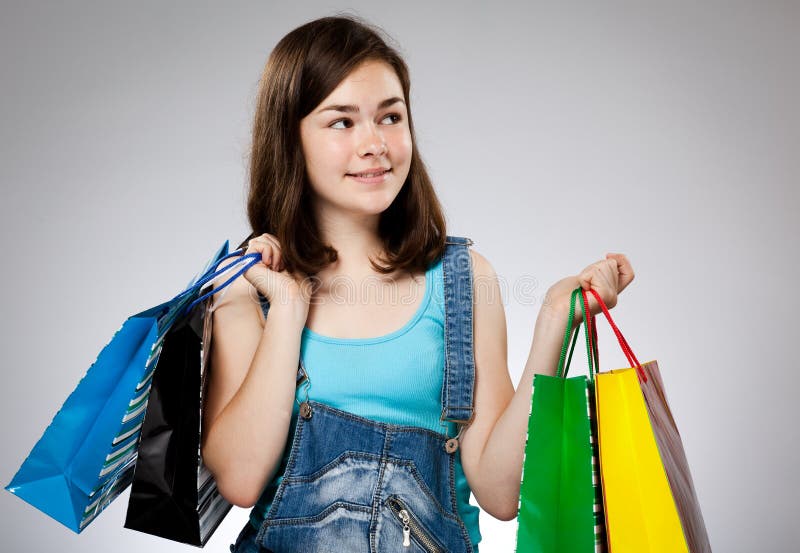 Girl holding shopping bag stock photo. Image of center 36654152