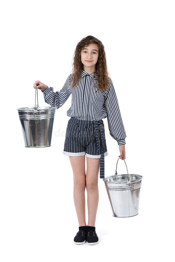 Girl holding two metal buckets