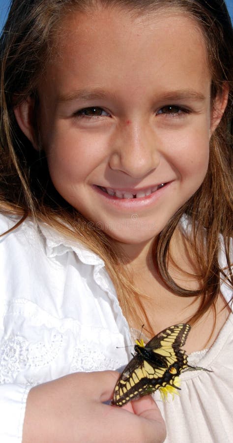 Girl holding Yellow swallowtail butterfly