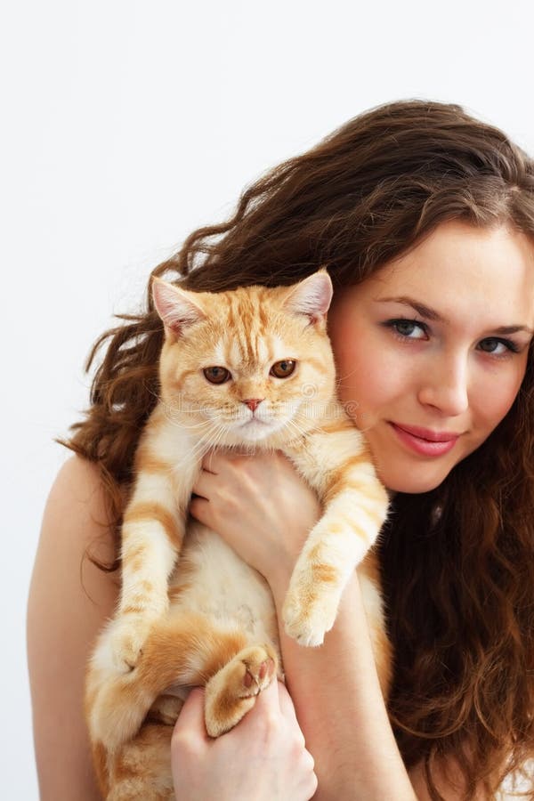 girl holds a British cat