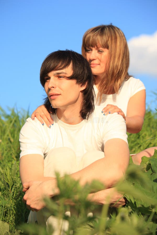 Girl Holds Guy Behind for Shoulders Stock Image Image of enamored