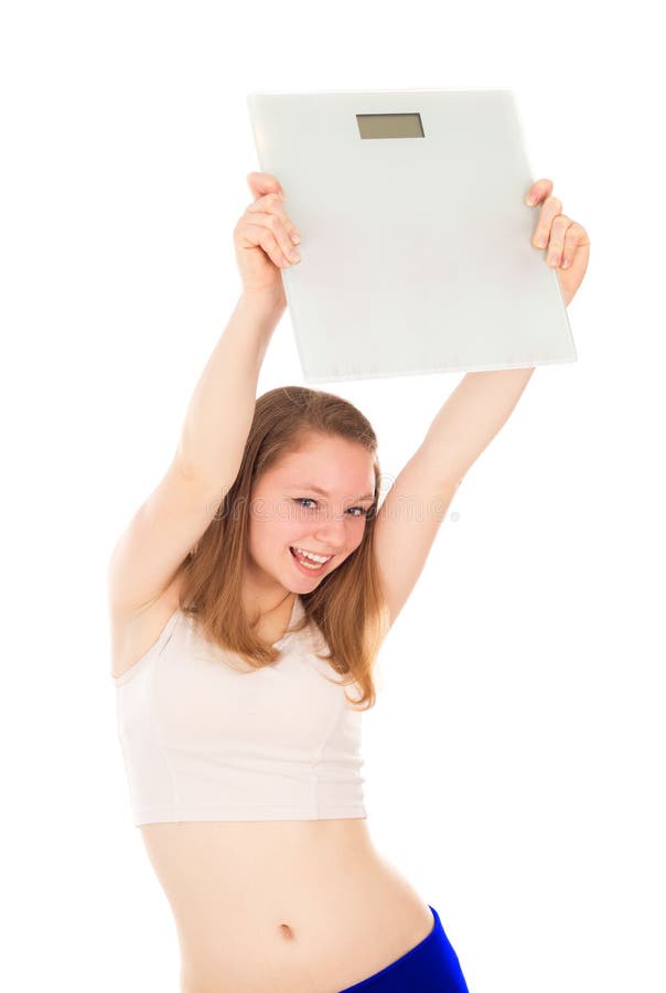 Girl holds the scales in his hand, and rejoices its achievements