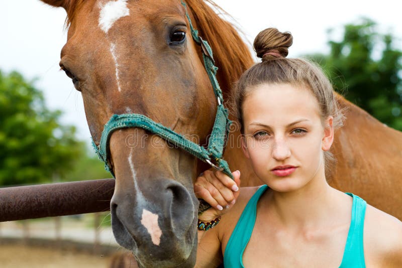 Girl and horse royalty free stock photography