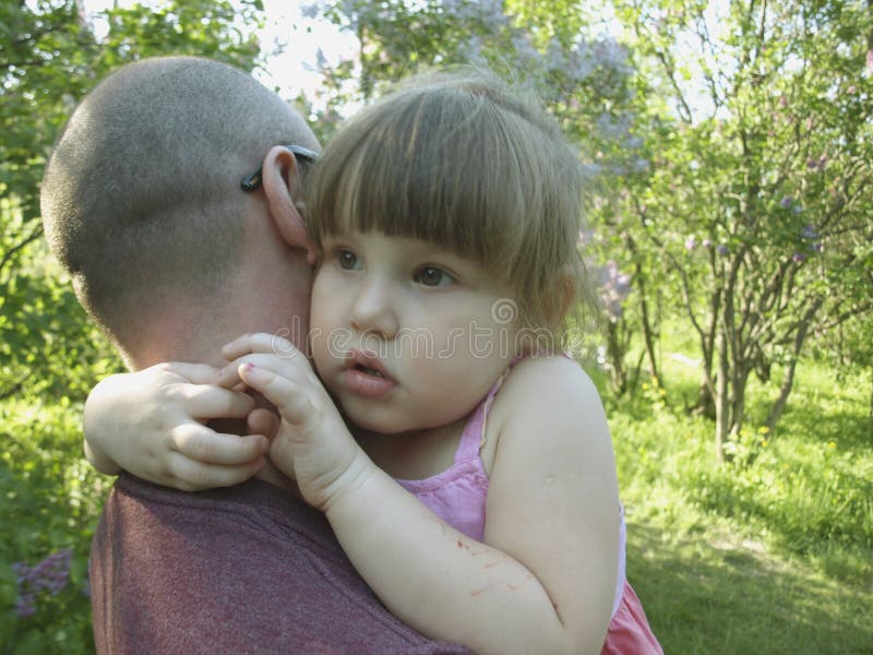 Girl hugging dad stock image. Image of children, nlittle 79119309