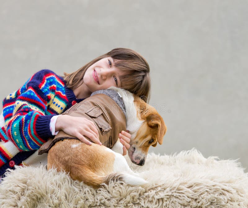 Girl hugging her dog stock photo. Image of adorable, affection 35411882
