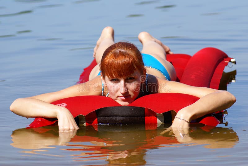 Girl on an inflatable mattress