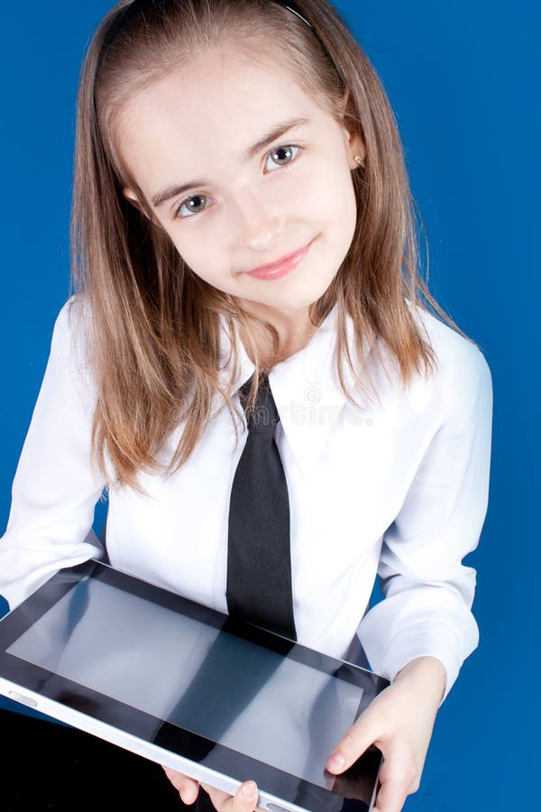 Girl with ipad like gadget stock image. Image of tablet 19846027