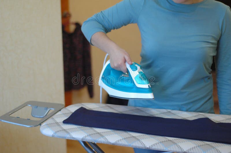 Girl Irons Clothes with Iron Stock Photo Image of group, board 80661216