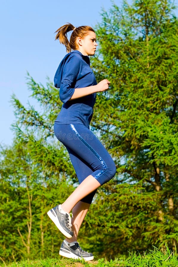 Girl jogging stock photo. Image of forest, person, green 14571212
