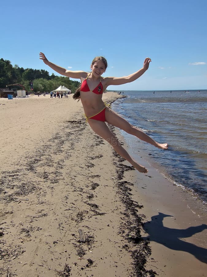 Girl jumping royalty free stock photography