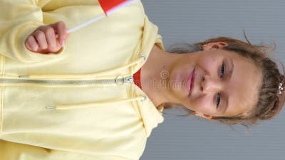 swiss preteens Girl is Keeping Flag of Switzerland in Her Hands. Caucasian Young Swiss  Female Teenager is Waving Small Swiss Flag Stock Footage - Video of little,  breeze: 296836310