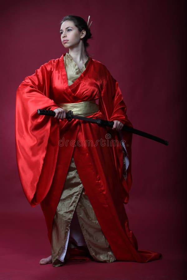 Girl in a kimono with a katana