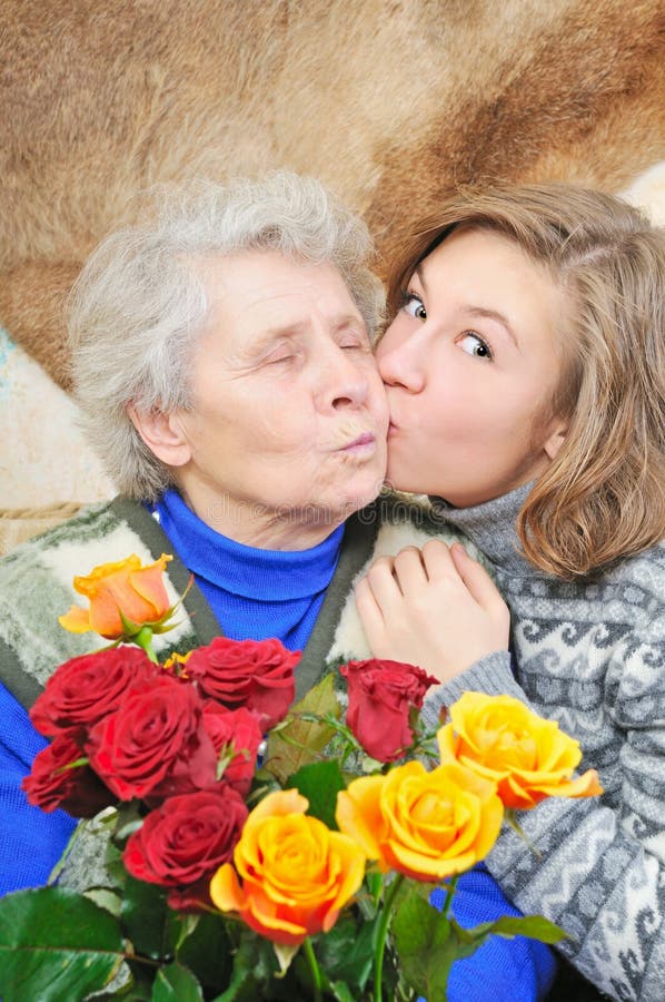 Girl kissed grandmother