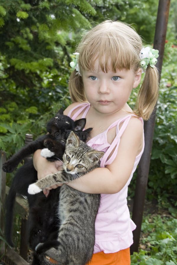 Girl with kittens