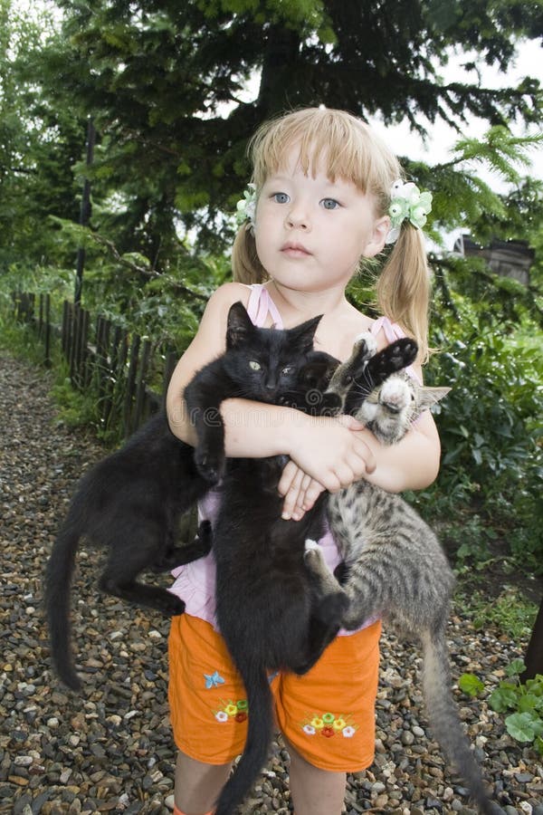 Girl with kittens
