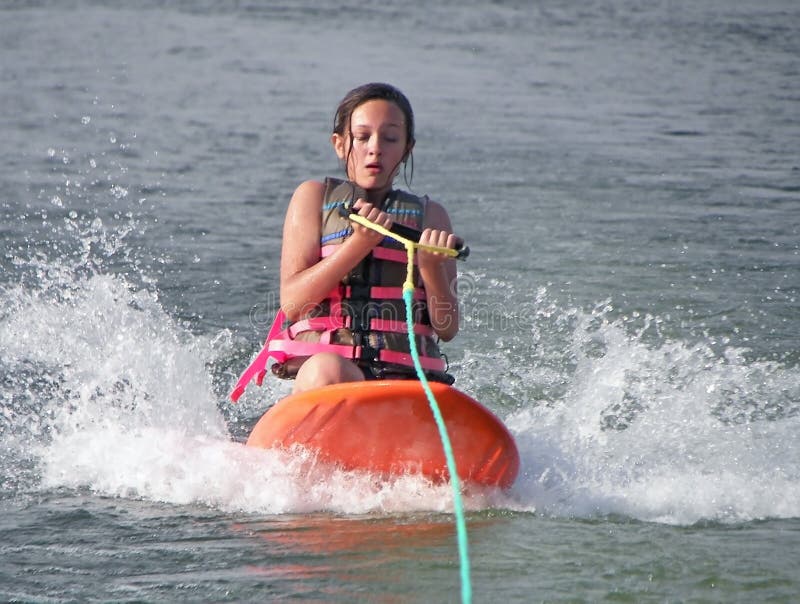 Girl Kneeboarding stock image. Image of serious, waters 3135511