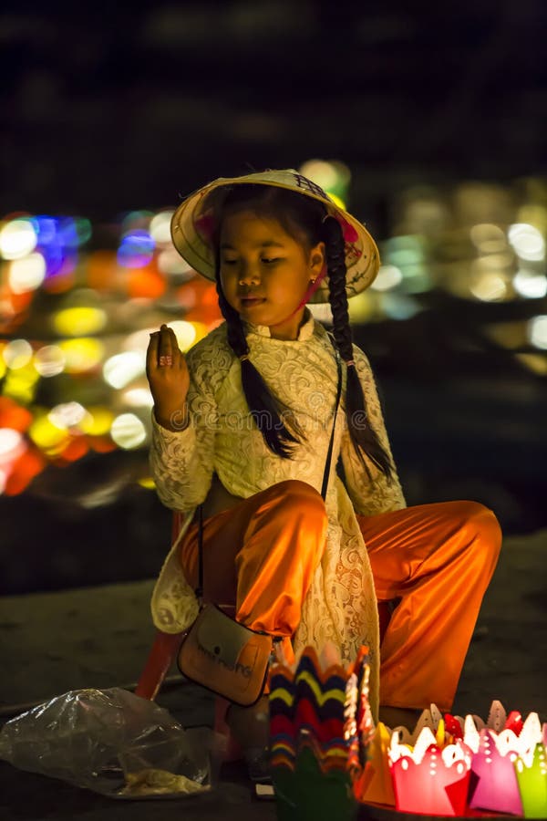 The girl with a lantern, editorial image. Image of costume 70495350