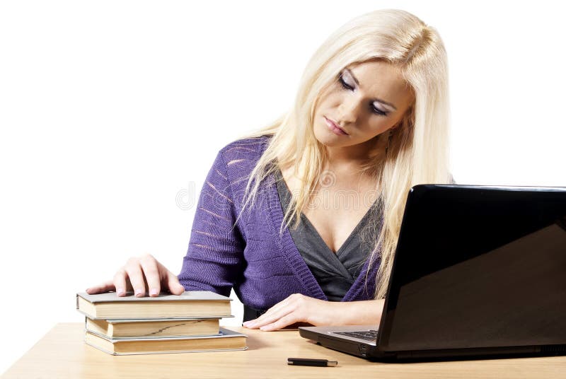 Girl of the laptop with the books