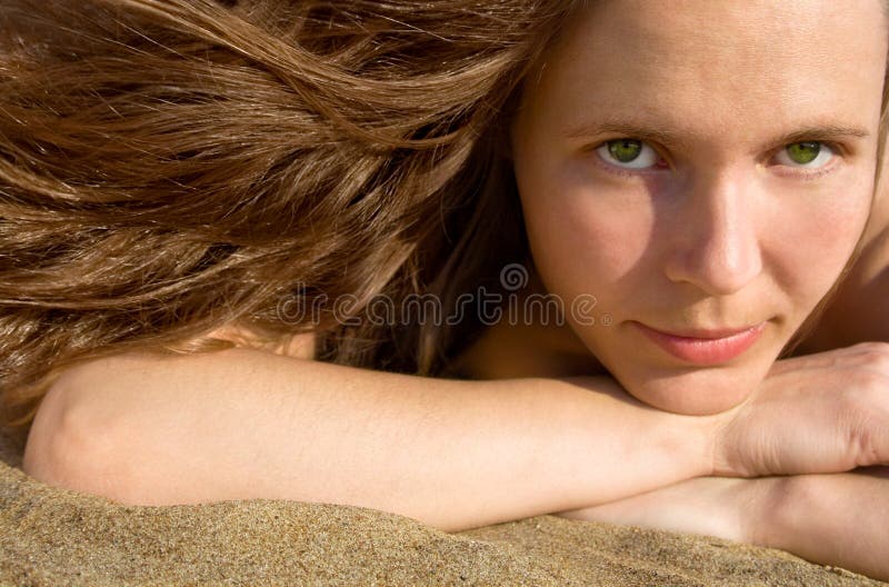 Girl laying on a beach-2