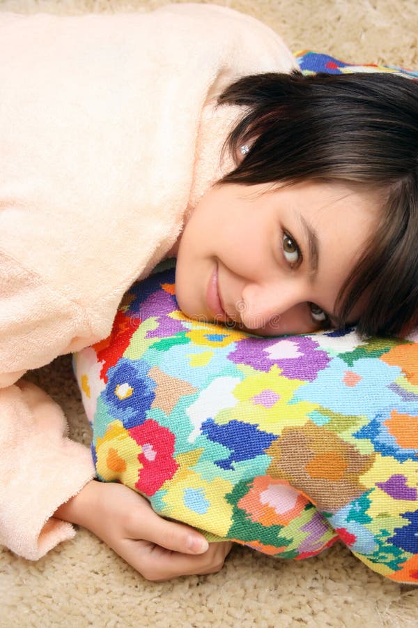 Girl laying on the pillow