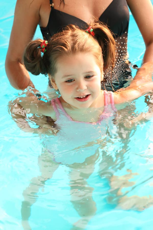 Young Girl Having Fun in the Pool Stock Image Image of resort, energy