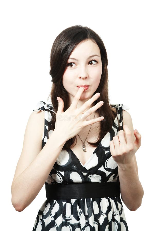 Girl licking her fingers