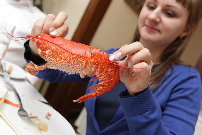 Girl and lobster stock image. Image of holding, meal, pursuit 6988669
