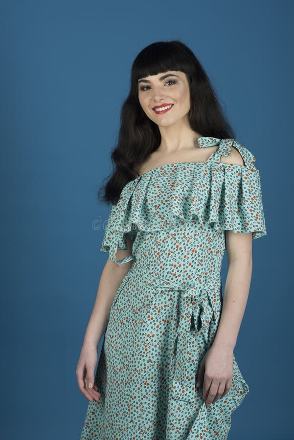 Girl with long brunette hair wears cerulean dress. stock photography Girl with long brunette hair wears cerulean dress. stock photography