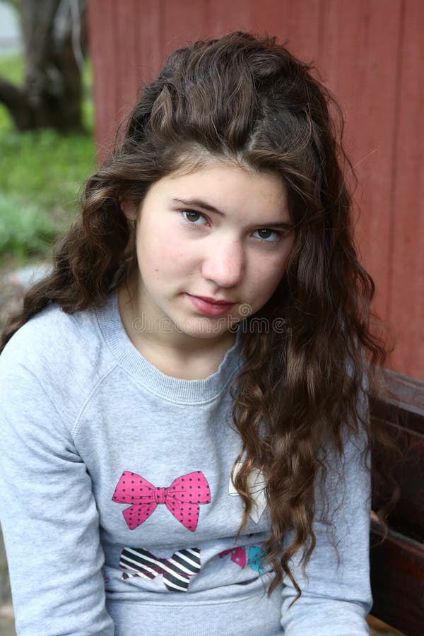 Girl with Long Curly Brown Hair Closeup Portriat Stock Image - Image of ...