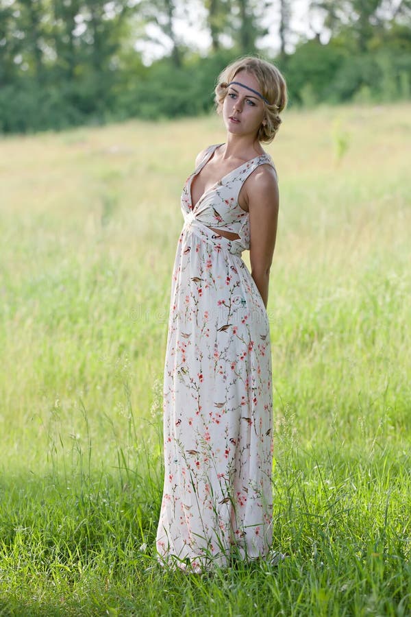 Girl in a a Long Dress on Nature Stock Photo - Image of beauty, tree ...