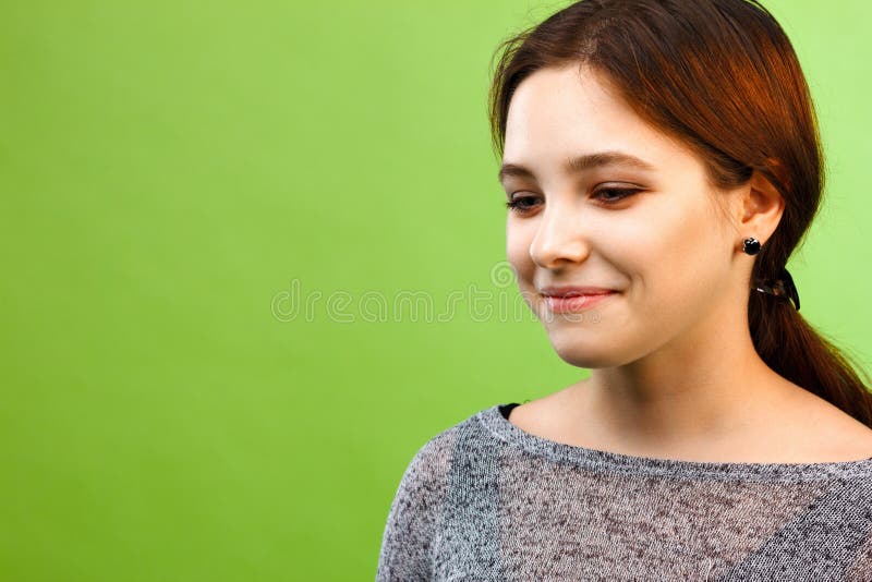 Girl Looking Down on Green Background Stock Photo Image of beautiful, beauty 67580000